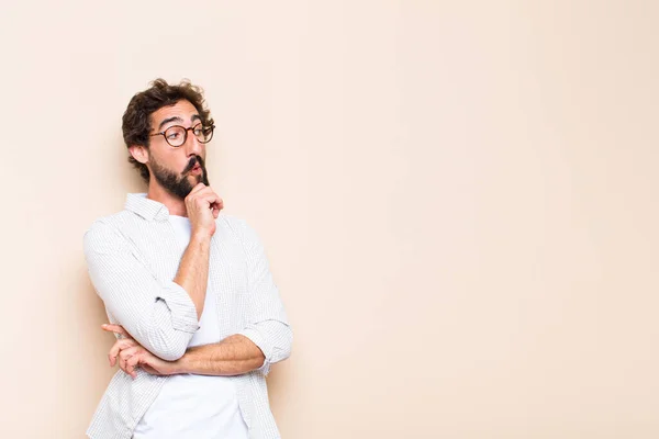 Young Cool Bearded Man Thinking Doubting Expression Royalty Free Stock Photos