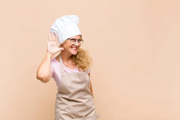 Middle Age Woman Baker Smiling Looking Curiously Side Trying Listen — Stock Photo, Image