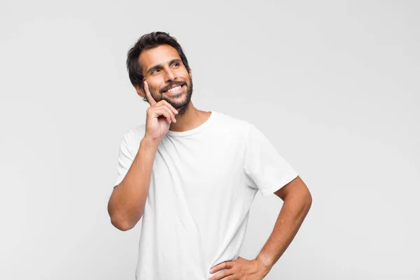 Young Latin Handsome Man Smiling Happily Daydreaming Doubting Looking Side — Stock Photo, Image