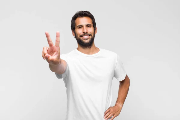 Young Latin Handsome Man Smiling Looking Happy Carefree Positive Gesturing — Stock Photo, Image