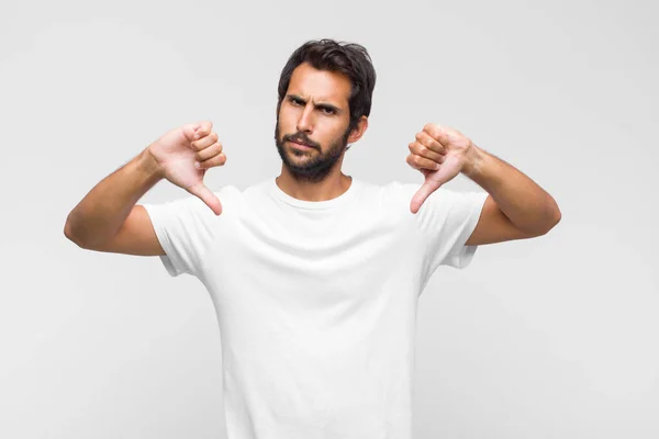 Young Latin Handsome Man Looking Sad Disappointed Angry Showing Thumbs — Stock Photo, Image