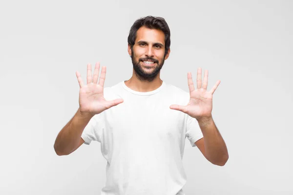 Young Latin Handsome Man Smiling Looking Friendly Showing Number Ten — Stock Photo, Image