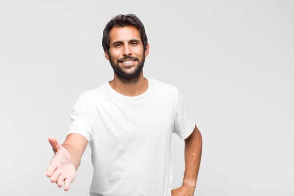 Young Latin Handsome Man Looking Serious Thoughtful Distrustful One Arm — Stock Photo, Image