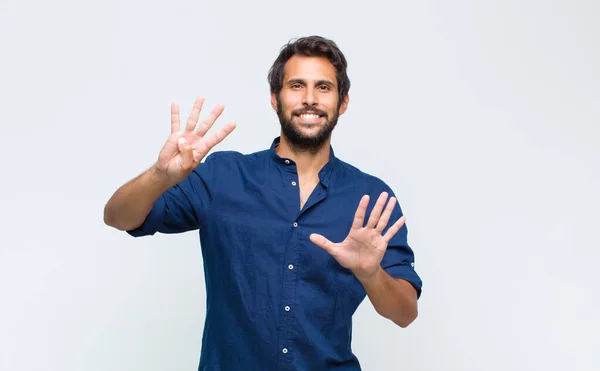 Jovem Latino Bonito Homem Sorrindo Olhando Amigável Mostrando Número Nove — Fotografia de Stock