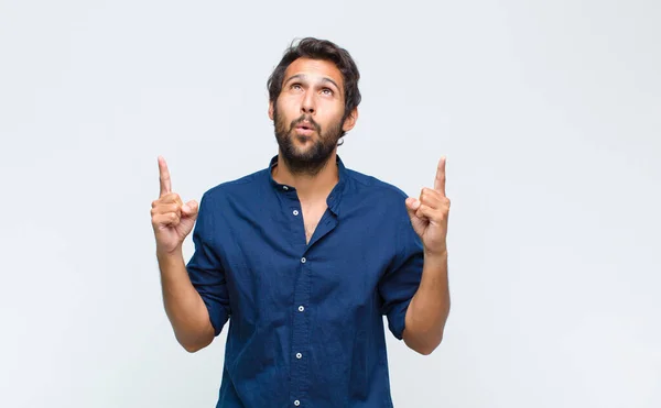 Young Latin Handsome Man Looking Shocked Amazed Open Mouthed Pointing — Stock Photo, Image