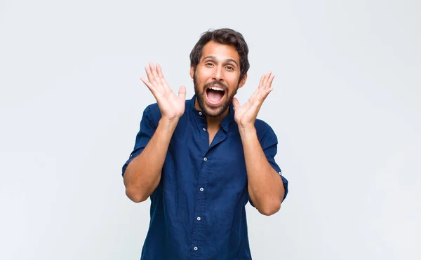 Young Latin Handsome Man Feeling Shocked Excited Laughing Amazed Happy — Stock Photo, Image