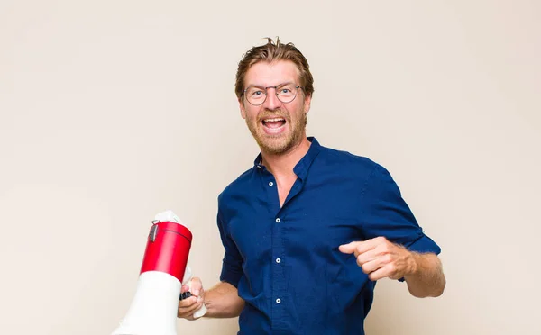 Adult Blonde Man Holding Megaphone — Stock Photo, Image