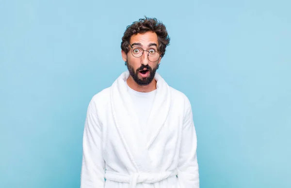 Young Bearded Man Wearing Bath Robe Looking Very Shocked Surprised — Stock Photo, Image