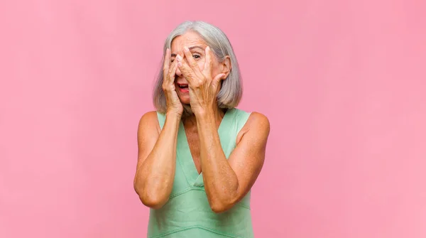 Middle Age Pretty Woman Covering Face Hands Peeking Fingers Surprised — Stock Photo, Image