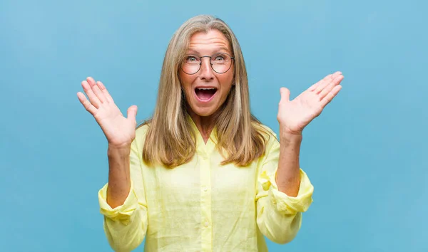 Middle Age Pretty Woman Happy Excited Surprised Amazed Covering Mouth — Stock Photo, Image