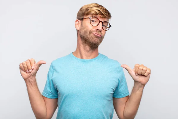 Young Blond Man Proud Expression Number One Concept — Stock Photo, Image