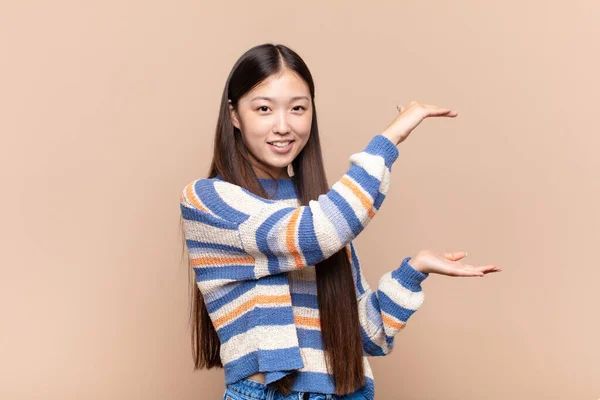 Asian Young Woman Smiling Feeling Happy Positive Satisfied Holding Showing — Stock Photo, Image