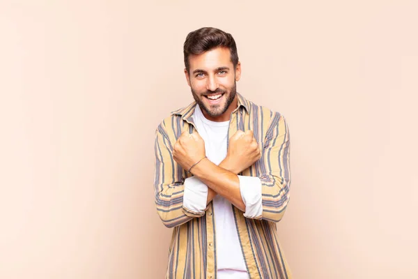 Young Man Smiling Cheerfully Celebrating Fists Clenched Arms Crossed Feeling — Stock Photo, Image