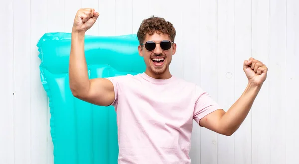 Young Man Shouting Triumphantly Looking Excited Happy Surprised Winner Celebrating — Stock Photo, Image