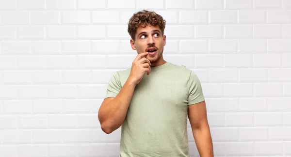 Young Man Surprised Nervous Worried Frightened Look Looking Side Copy — Stock Photo, Image