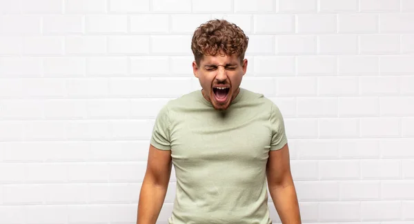 Young Man Shouting Aggressively Looking Very Angry Frustrated Outraged Annoyed — Stock Photo, Image