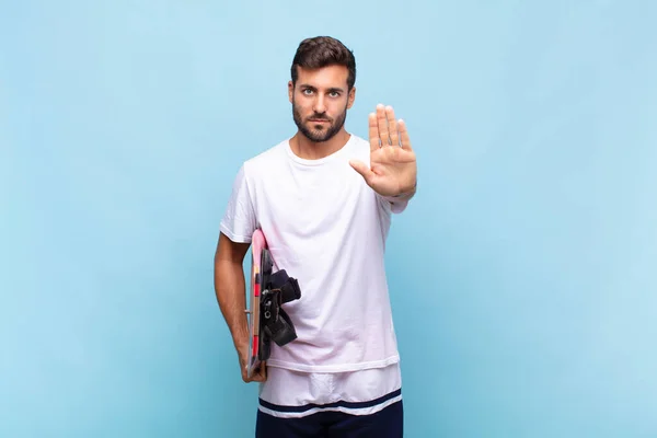 Young Man Looking Serious Stern Displeased Angry Showing Open Palm — Stock Photo, Image