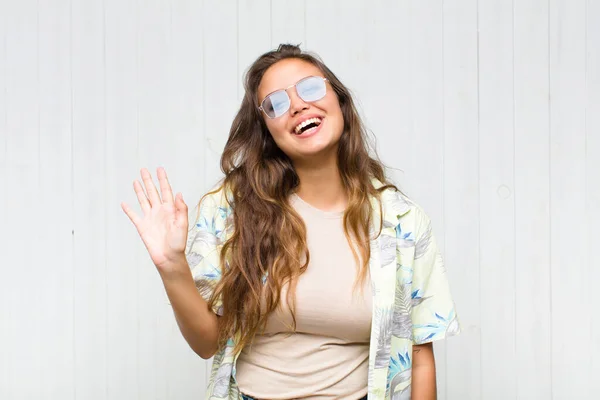 Young Pretty Woman Smiling Happily Cheerfully Waving Hand Welcoming Greeting — Stock Photo, Image