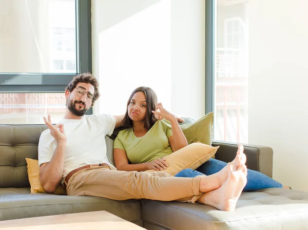 Young Couple Looking Arrogant Successful Positive Proud Pointing Self New — Stock Photo, Image