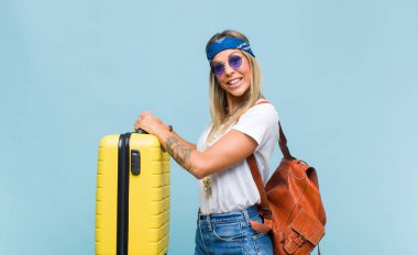 young pretty hippie woman  with a leather bag. tourist concept
