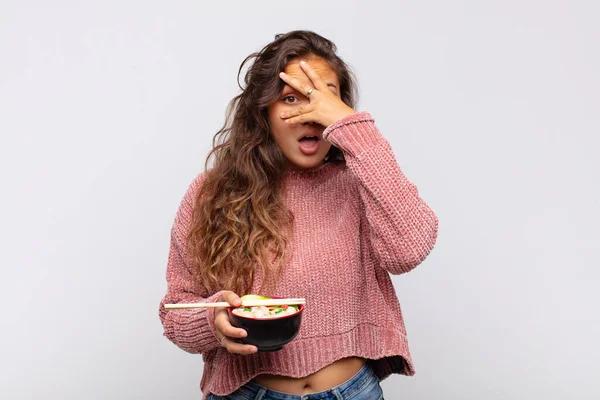 Young Pretty Woman Noodles Looking Shocked Scared Terrified Covering Face — Stockfoto