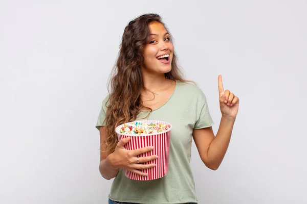 Young Woman Pop Conrs Bucket Feeling Happy Excited Genius Realizing — Stock Photo, Image