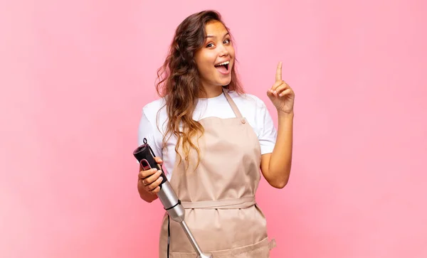 Young Woman Baker Feeling Happy Excited Genius Realizing Idea Cheerfully — Zdjęcie stockowe