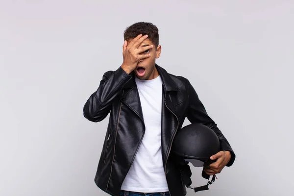 Young Motorbike Rider Looking Shocked Scared Terrified Covering Face Hand — Fotografia de Stock