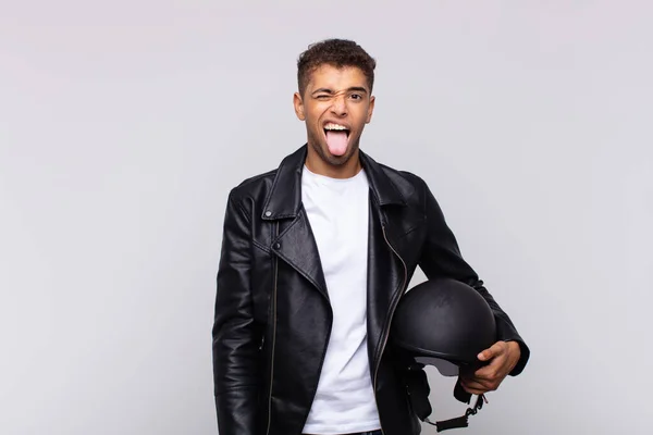 Young Motorbike Rider Cheerful Carefree Rebellious Attitude Joking Sticking Tongue — Stockfoto