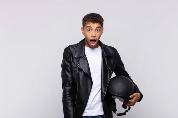Young Motorbike Rider Looking Very Shocked Surprised Staring Open Mouth — Foto Stock