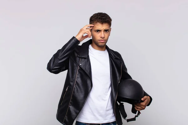 Young Motorbike Rider Feeling Confused Puzzled Showing You Insane Crazy — Stockfoto