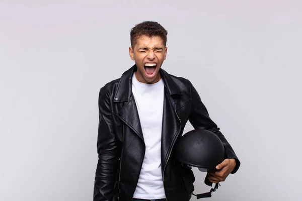 Young Motorbike Rider Shouting Aggressively Looking Very Angry Frustrated Outraged — Fotografia de Stock