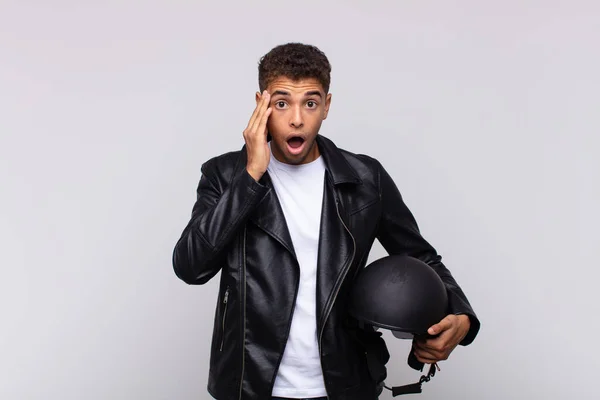 Young Motorbike Rider Looking Surprised Open Mouthed Shocked Realizing New — Foto Stock