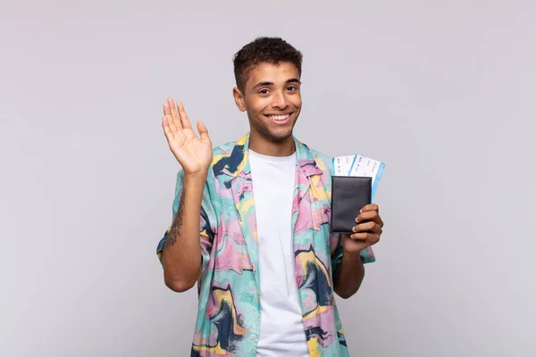 Young South American Man Smiling Happily Cheerfully Waving Hand Welcoming — Stock fotografie