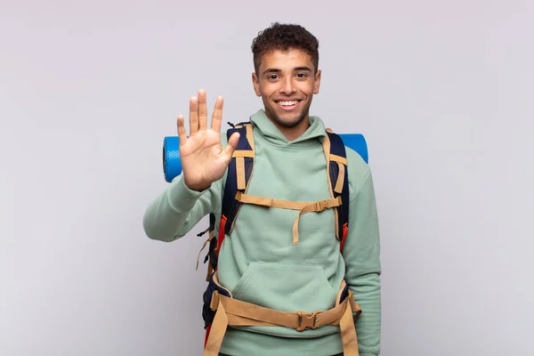 Young Hiker Man Smiling Looking Friendly Showing Number Five Fifth — Fotografia de Stock