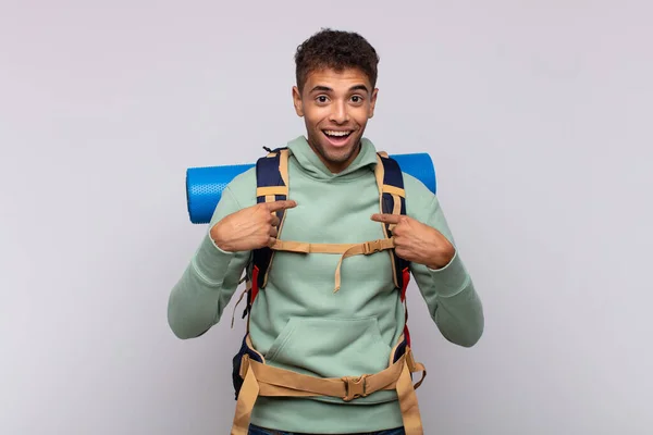 Young Hiker Man Feeling Happy Surprised Proud Pointing Self Excited — Fotografia de Stock