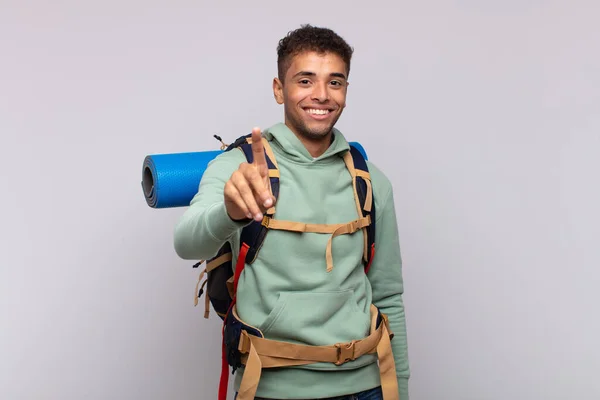 Young Hiker Man Smiling Proudly Confidently Making Number One Pose — Fotografia de Stock