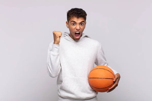 Young Man Shouting Aggressively Angry Expression Fists Clenched Celebrating Success — Stockfoto