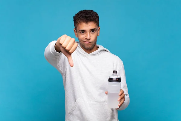 Young Man Feeling Cross Angry Annoyed Disappointed Displeased Showing Thumbs — Fotografia de Stock