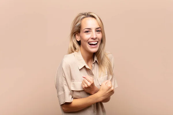 Woman Smiling Cheerfully Celebrating Fists Clenched Arms Crossed Feeling Happy — Stock Photo, Image