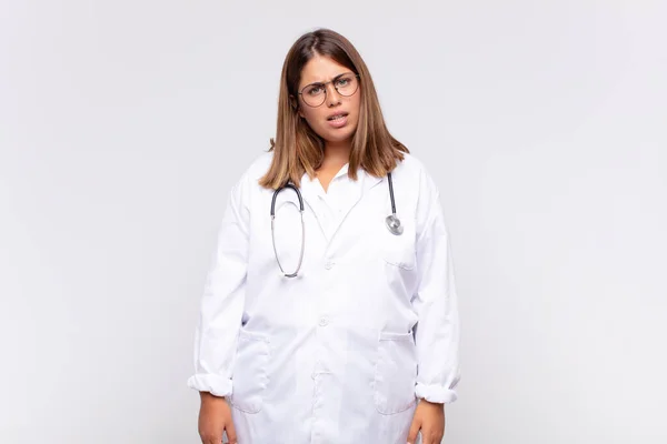 Young Woman Physician Feeling Puzzled Confused Dumb Stunned Expression Looking — Fotografia de Stock