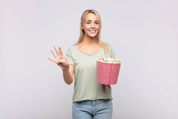 Young Woman Pop Corns Bucket Smiling Looking Friendly Showing Number — Stock Photo, Image