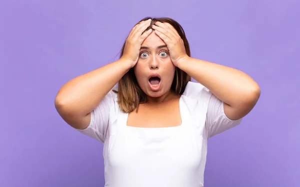 Young Blonde Woman Feeling Horrified Shocked Raising Hands Head Panicking — Stock Photo, Image