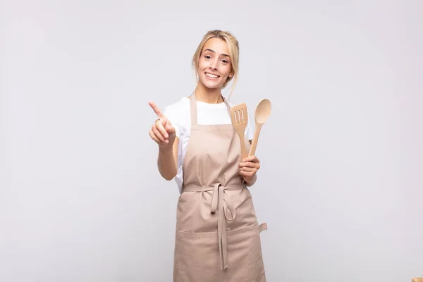 Young Woman Chef Smiling Proudly Confidently Making Number One Pose — 图库照片