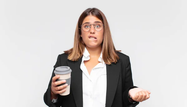 Young Businesswoman Coffee Looking Puzzled Confused Biting Lip Nervous Gesture — Stock Photo, Image