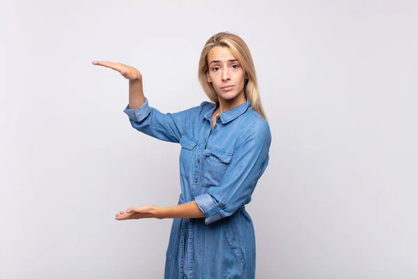 Woman Holding Object Both Hands Side Copy Space Showing Offering — Stock Photo, Image