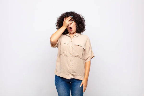 Woman Looking Shocked Scared Terrified Covering Face Hand Peeking Fingers — Stock Photo, Image