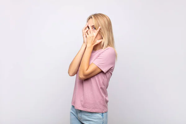 Woman Feeling Scared Embarrassed Peeking Spying Eyes Half Covered Hands — Stock Photo, Image
