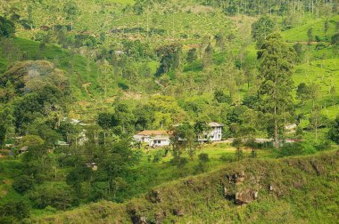 Güzel manzara ve evleri Kandi, Sri Lanka ile kırsal görünümüne Kandi, Sri Lanka - 22 Mayıs 2011:.