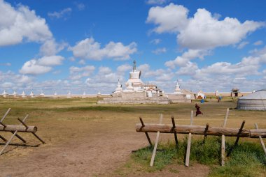 KHARKHORIN, MONGOLIA - AUGUST 22, 2006: View to the stupa in Erdene Zuu monastery in Kharkhorin, Mongolia. Erdene Zuu monastery is a UNESCO World Heritage site. clipart